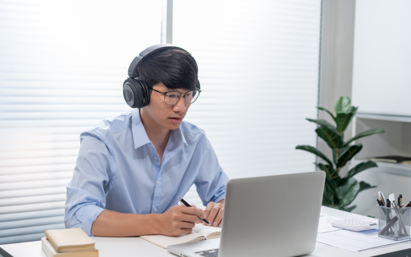 A Learntit online tuition session in progress, with a student working through a maths problem on screen while the tutor provides explanation and feedback in real time